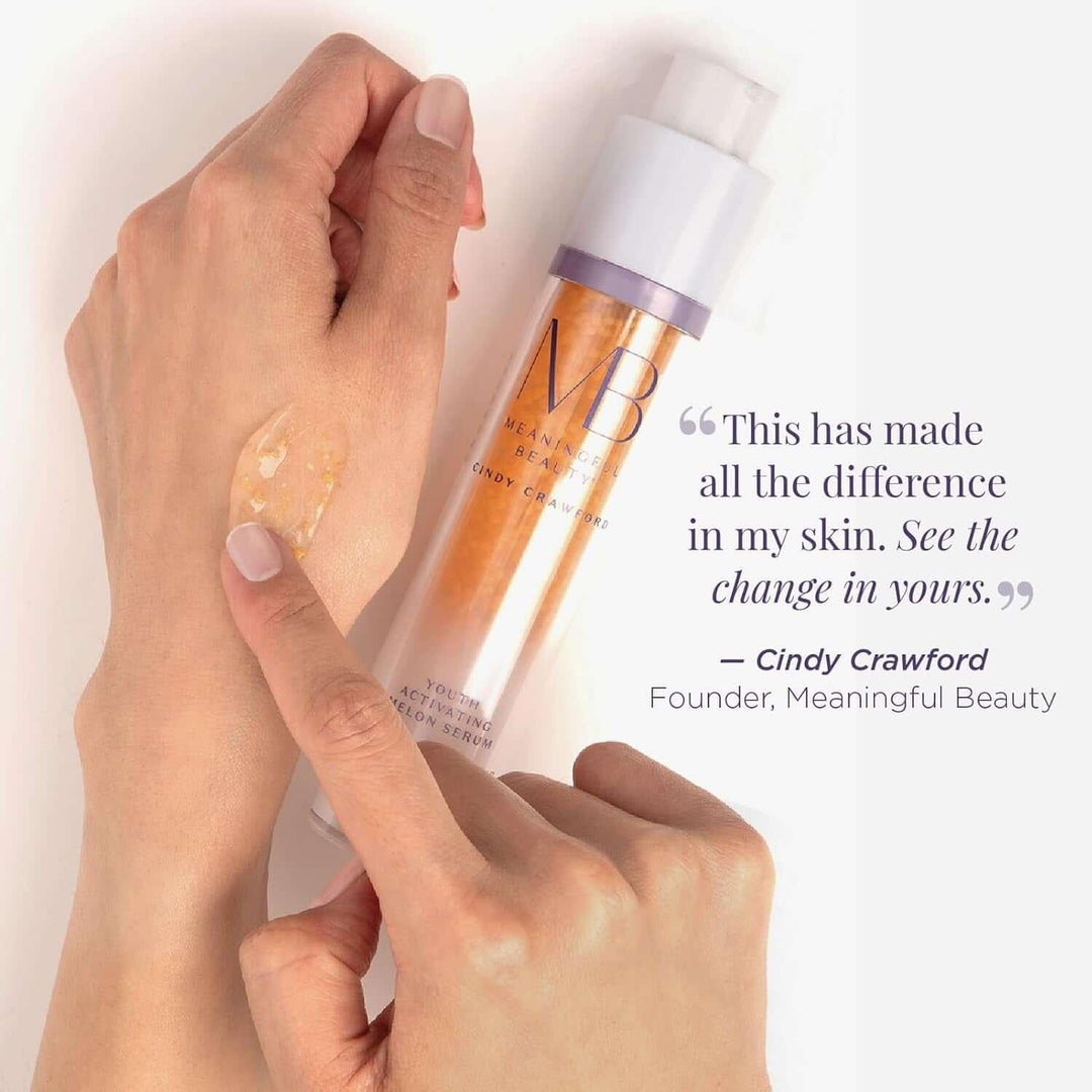 Applying Meaningful Beauty Youth Activating Melon Serum on hand with testimonial from founder Cindy Crawford