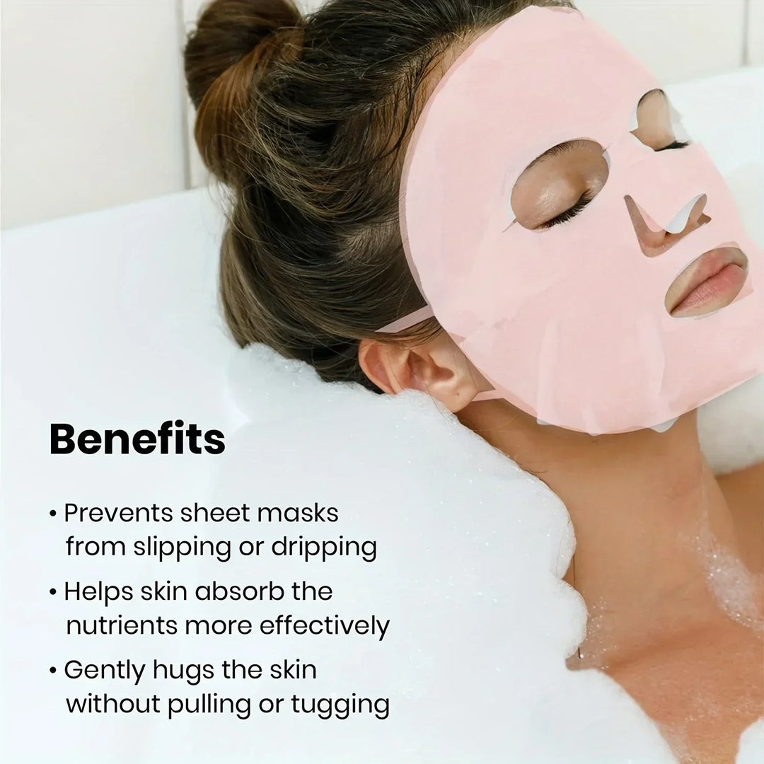 Woman relaxing in a bubble bath wearing a pink sheet mask for skincare benefits