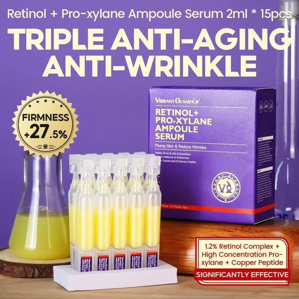 Vibrant Glamour Retinol + Pro-xylane Ampoule Serum with 15 yellow vials and purple anti-aging box