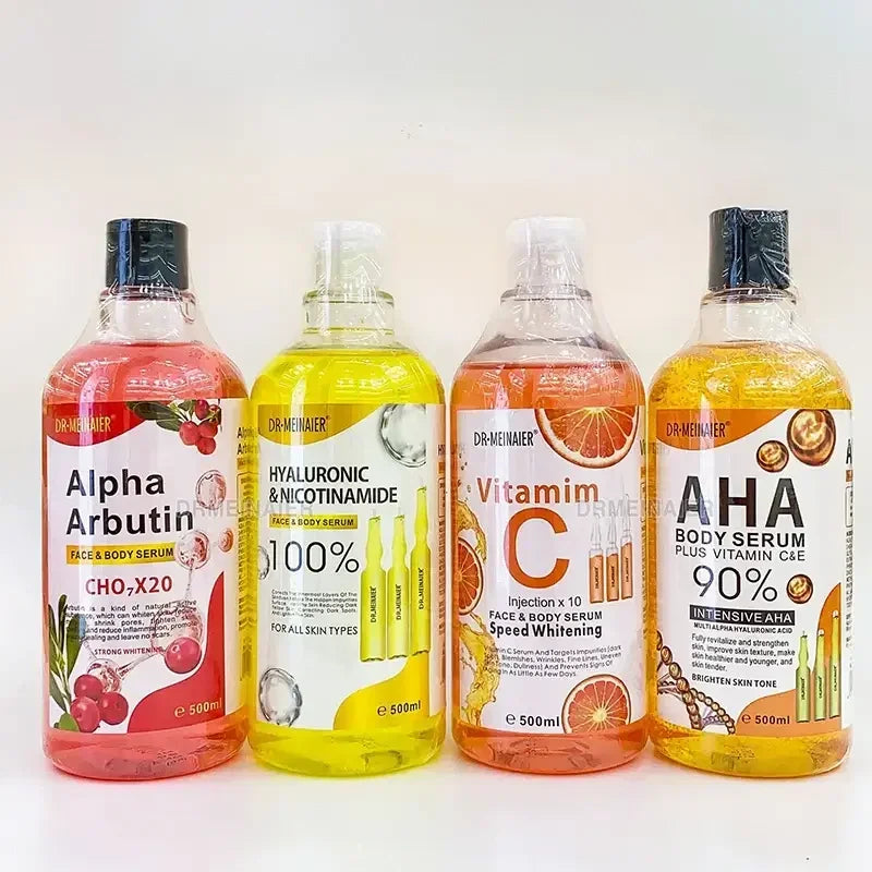Four 500ml Dr. Meinaier face and body serums: Alpha Arbutin, Hyaluronic & Nicotinamide, Vitamin C, and AHA plus vitamins