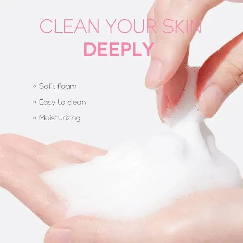 Hands holding and pulling soft foam cleanser illustrating deep skin cleaning with moisturizing benefits