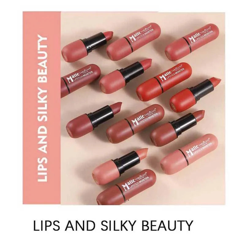 Matte lipstick collection in various shades of pink, red, and nude arranged on beige background with text lips and silky beauty