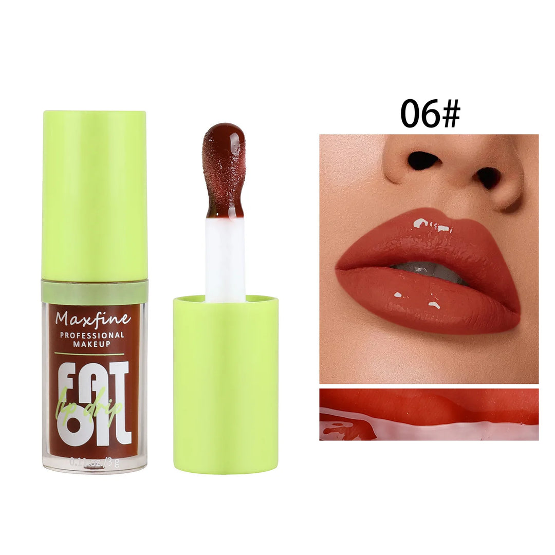 Maxfine Fat Oil lip gloss in brown shade 06 with green cap and glossy lip color application
