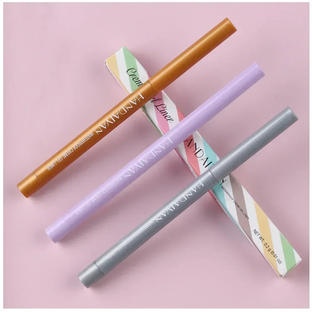 Three colorful HANDAVAN waterproof cream gel eyeliner pencils on pastel pink background with striped packaging