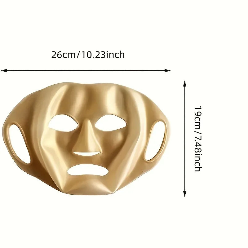 Gold metallic facial mask with cutouts for eyes, nose, and mouth, 26x19cm dimensions