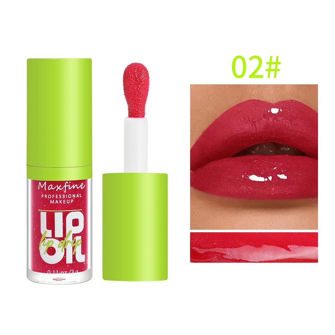 Maxfine professional makeup lip oil with bright red shade applicator and glossy red lips close-up