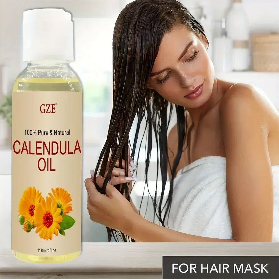 Bottle of GZE 100% Pure Natural Calendula Oil with woman applying hair mask on wet hair