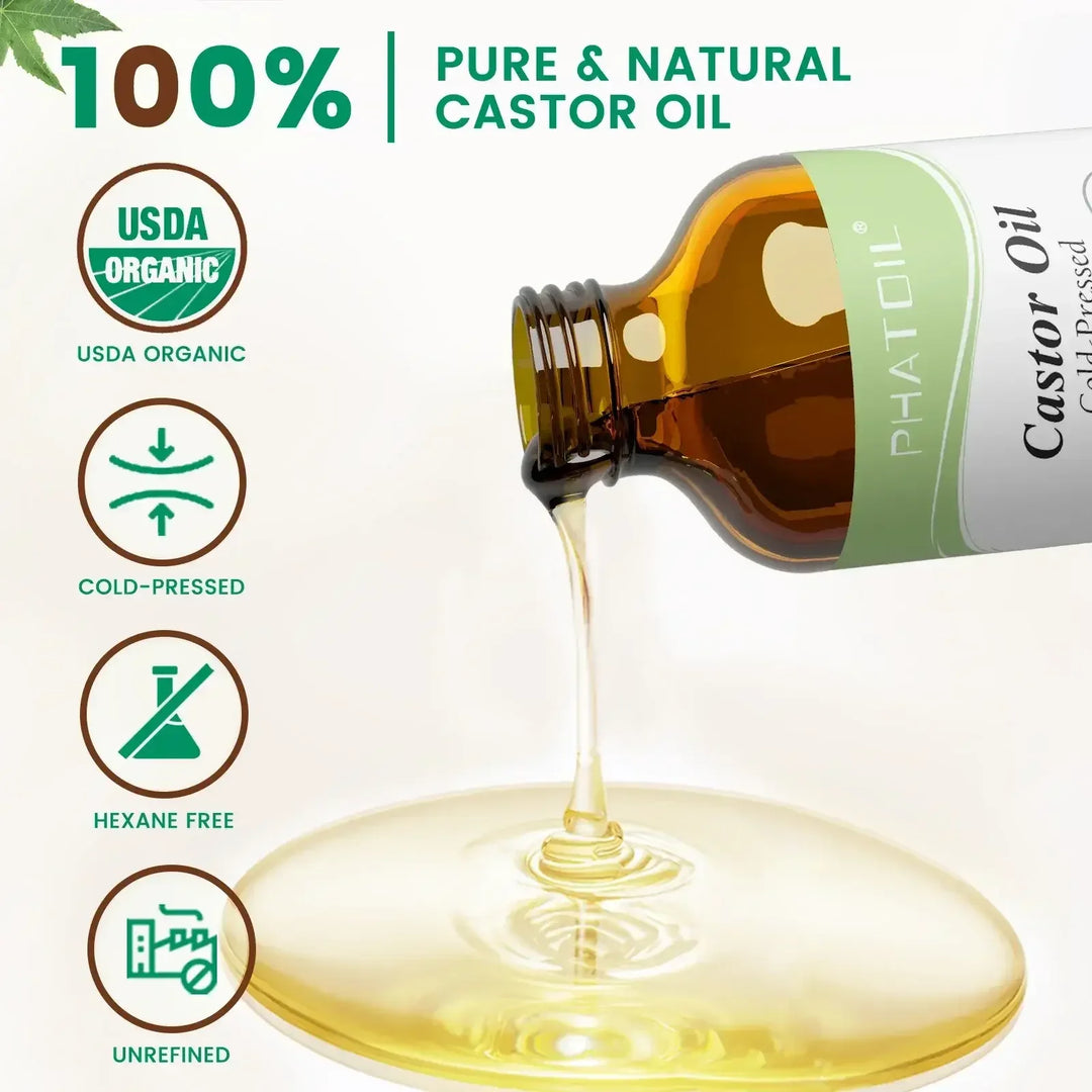 Pure and natural cold-pressed castor oil pouring from a brown glass bottle with USDA organic, hexane free, and unrefined icons