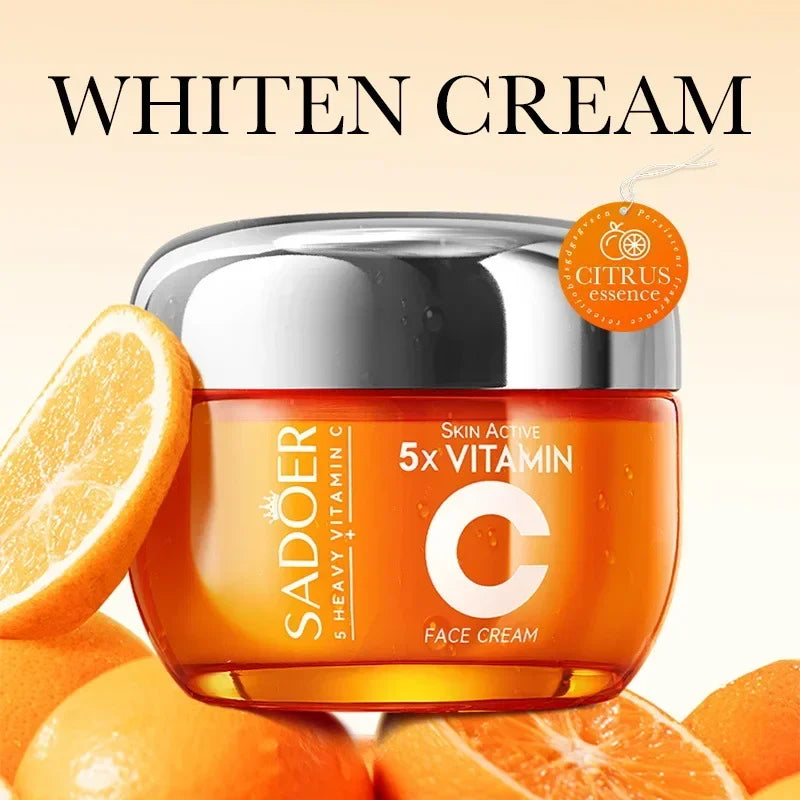 Sadoer 5x Vitamin C face cream jar with citrus essence, surrounded by fresh oranges