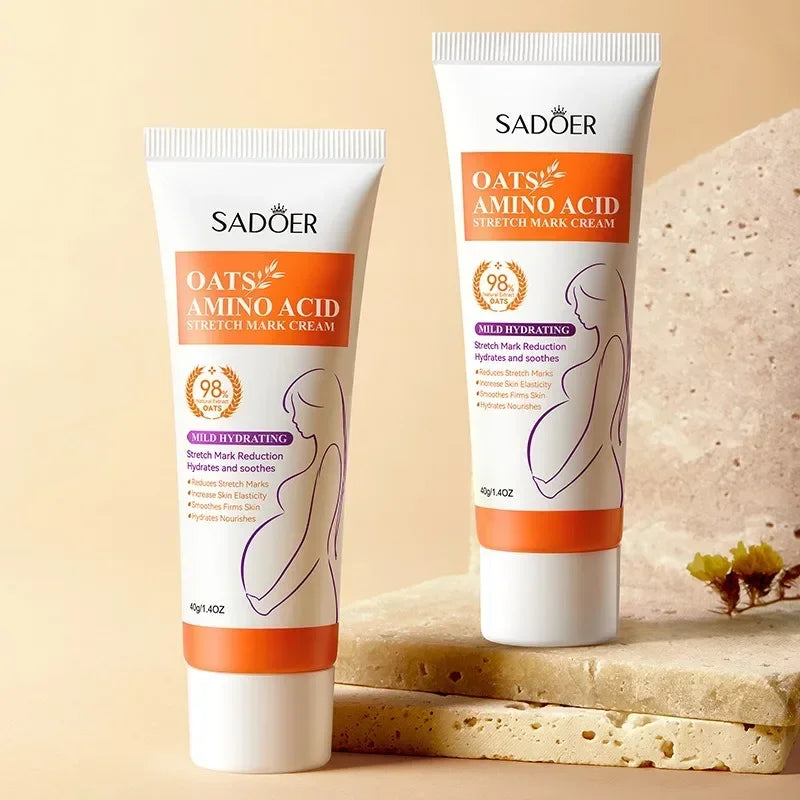 Sadoer Oats Amino Acid Stretch Mark Cream tubes with pregnant woman illustration on beige stone background