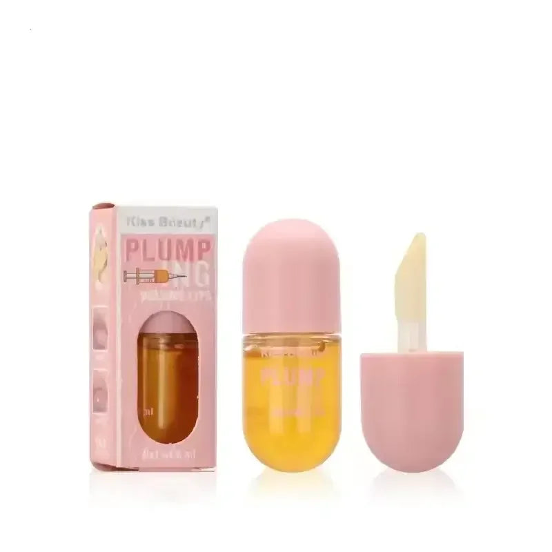 Kiss Beauty plumping lip serum in small pink and transparent bottle with applicator and pink box