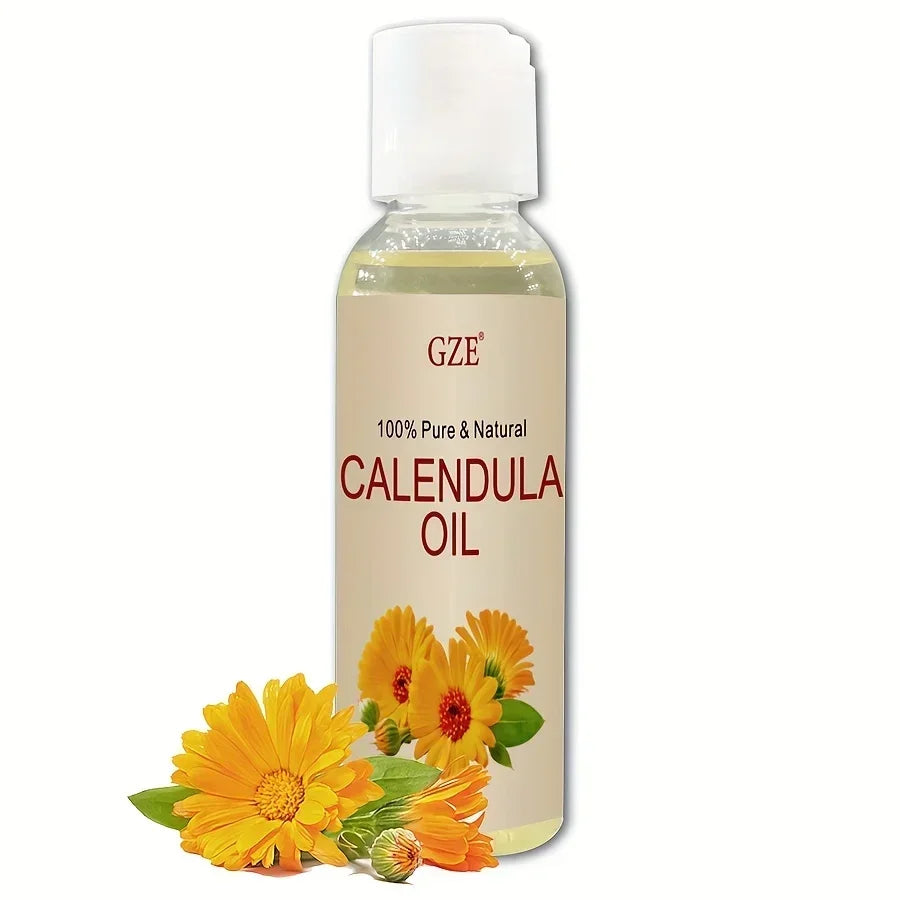 GZE 100% Pure & Natural Calendula Oil bottle with fresh calendula flowers on white background