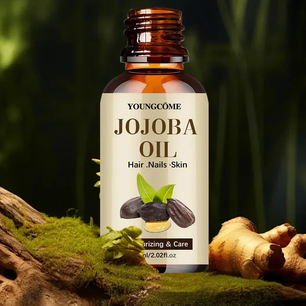 Amber bottle of Youngcome Jojoba Oil for hair, nails, and skin on mossy wood with ginger root backdrop