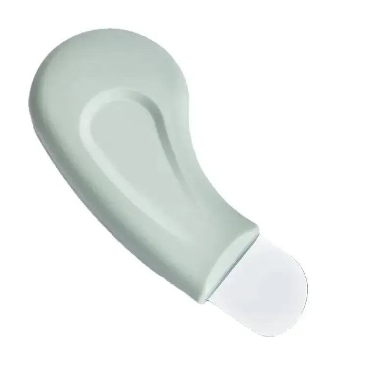 Light gray ergonomic silicone handle with transparent curved tip on white background