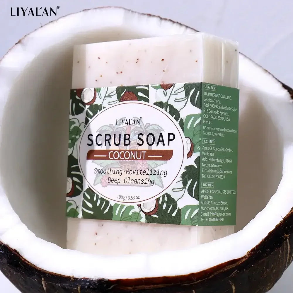 Liyalan coconut scrub soap bar with tropical leaf packaging inside a halved coconut shell